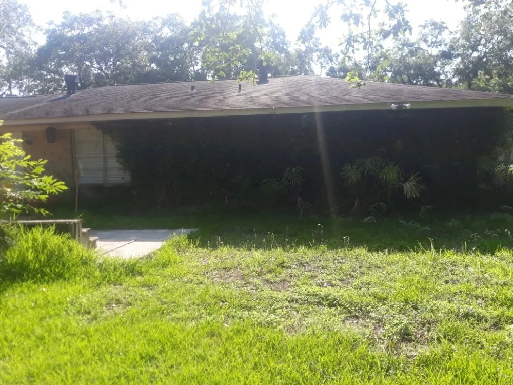 Local lawn mowing service near you in Santa Fe, TX by A Rebel Does It Best