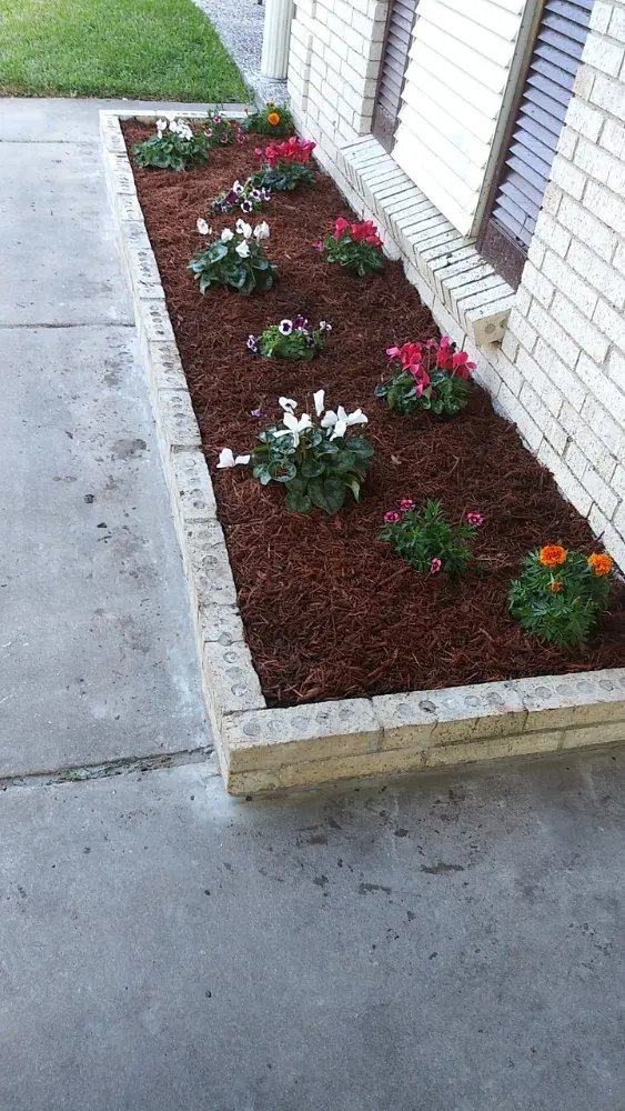Professional landscape installation in Santa Fe, TX by A Rebel Does It Best