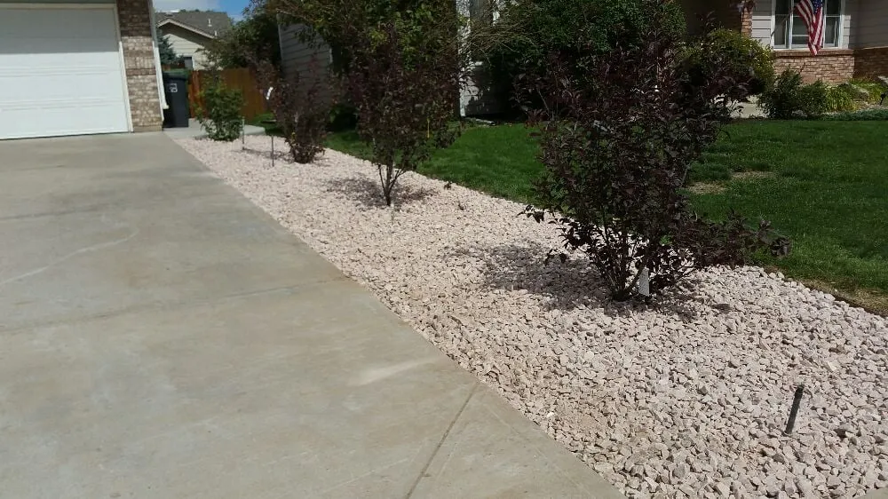 Local outdoor landscaping for year-round maintenance across Loveland, CO - A Step Above Property Services