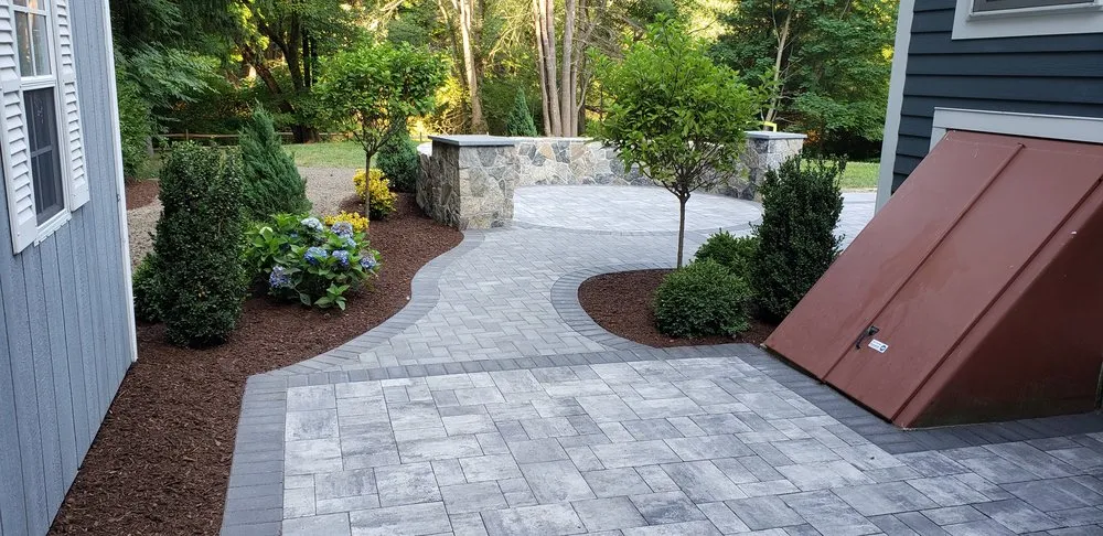 Custom yard cleanup service near you across Sudbury, MA - A Stone Flake