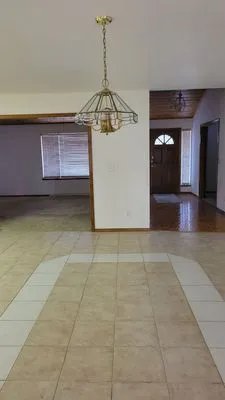 A .T. Landscaping Logo