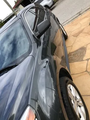 A Touch By Santiago’s Care Logo