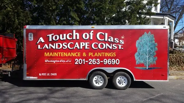 A Touch of Class Landscaping Contractors Logo