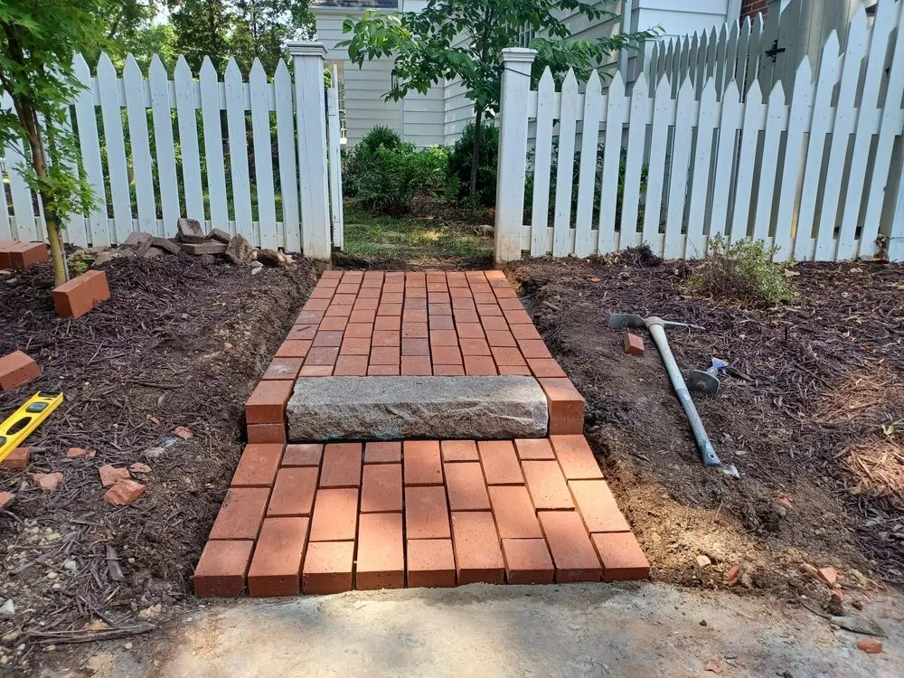 Professional lawn mowing service for year-round maintenance across Mooresville, NC - A V E Landscaping