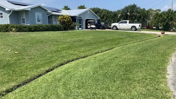 A1 Moto Lawn Service Logo