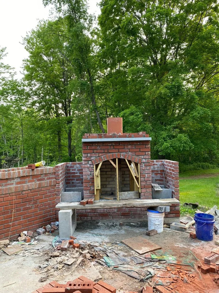 Professional lawn mowing service for outdoor upgrades across Latham, NY - AA And Son Construction plus Landscaping and Hardscaping