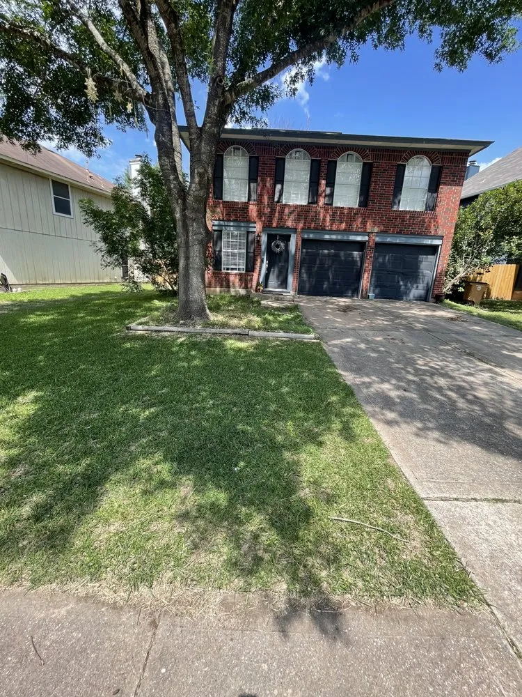 Custom lawn mowing service for year-round maintenance in Austin, TX by AA Landscaping and Construction