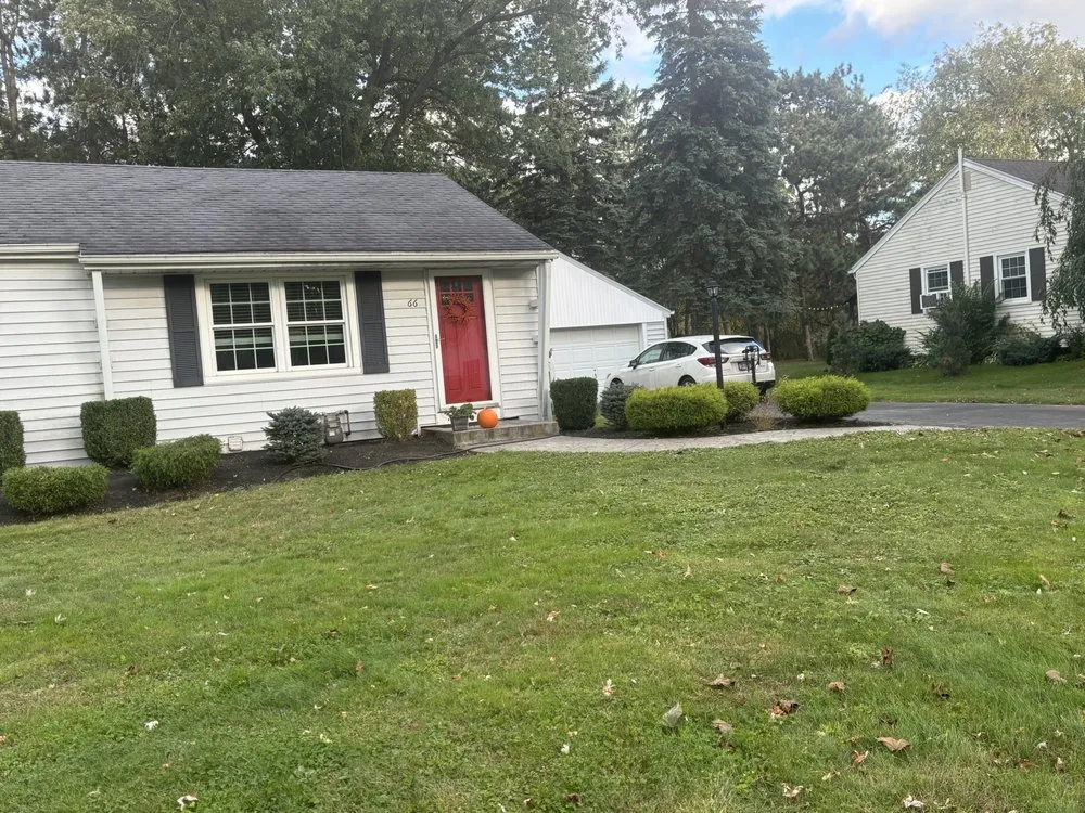 Custom landscape installation in Orchard Park, NY by AA Landscaping And Tree Care