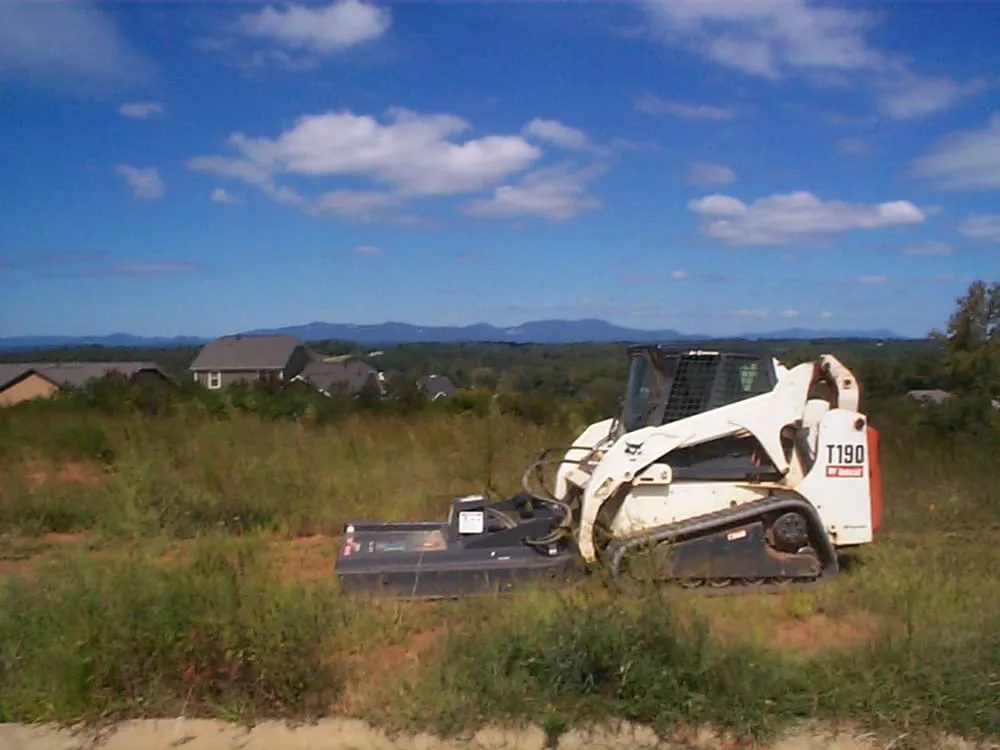 Custom landscape design with custom design in Spartanburg, SC by AAA Bobcat & Landscaping Services