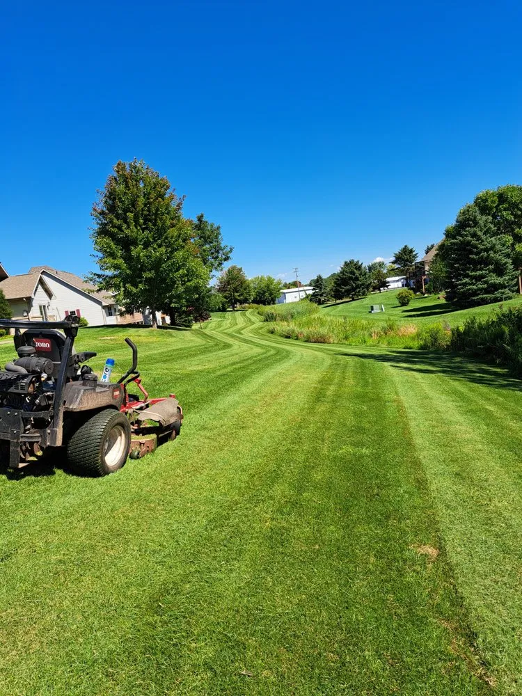 Affordable lawn care service near you in Neenah, WI by AAA Lawn Care & Services