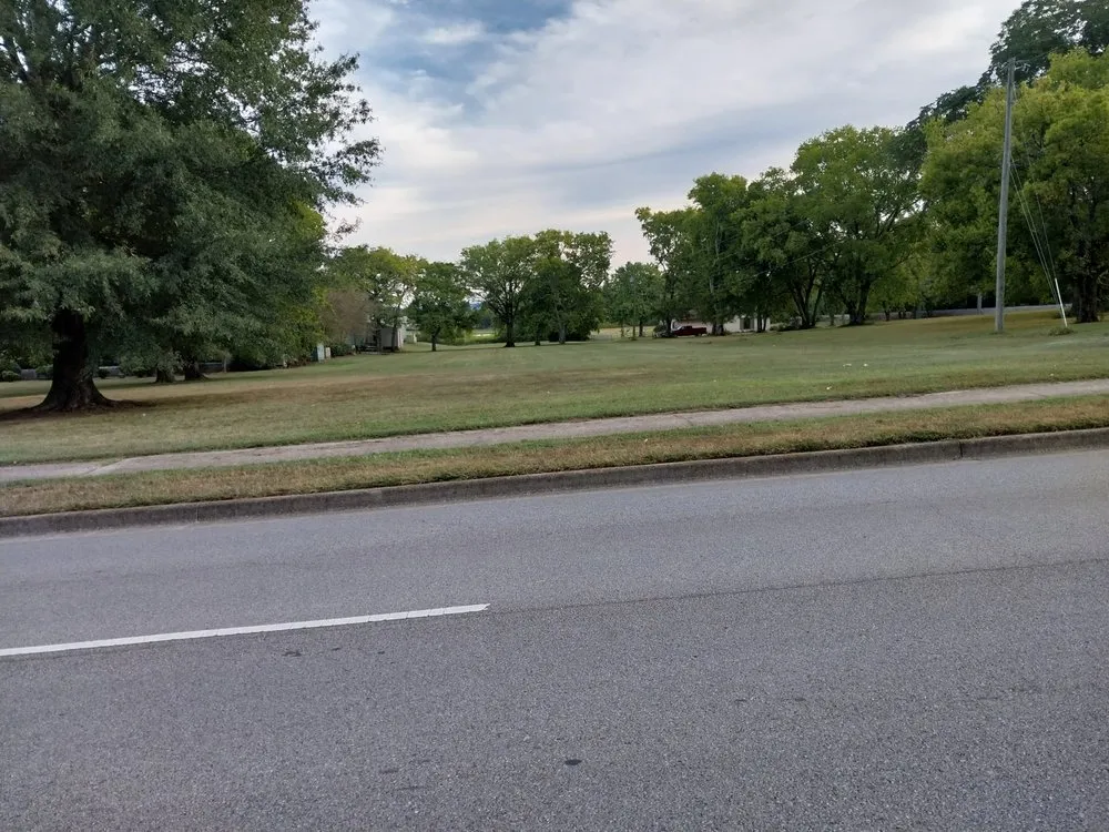 Affordable lawn mowing service with custom design in Huntsville, AL by Aaa lawn care