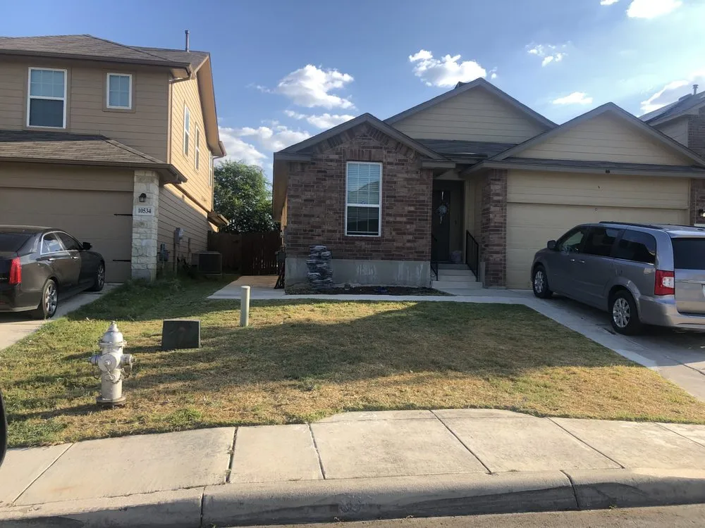 Professional residential landscaping in Timberwood Park, TX by AAA Mowing And Landscaping