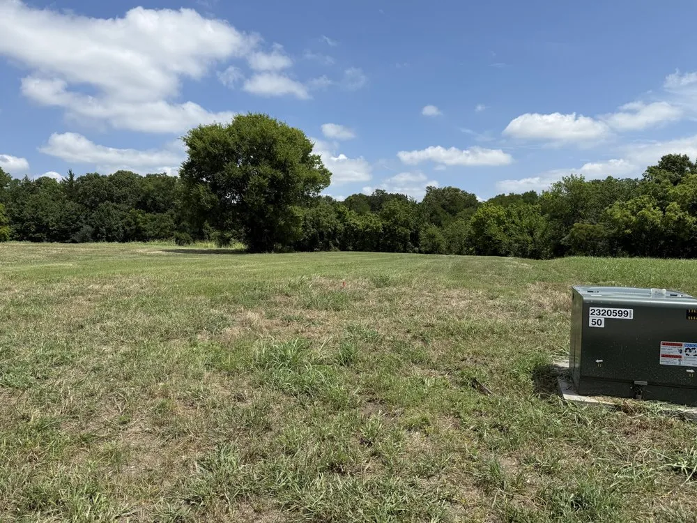 Professional yard cleanup service for year-round maintenance in Celina, TX by AARCO Partners Tractor Services