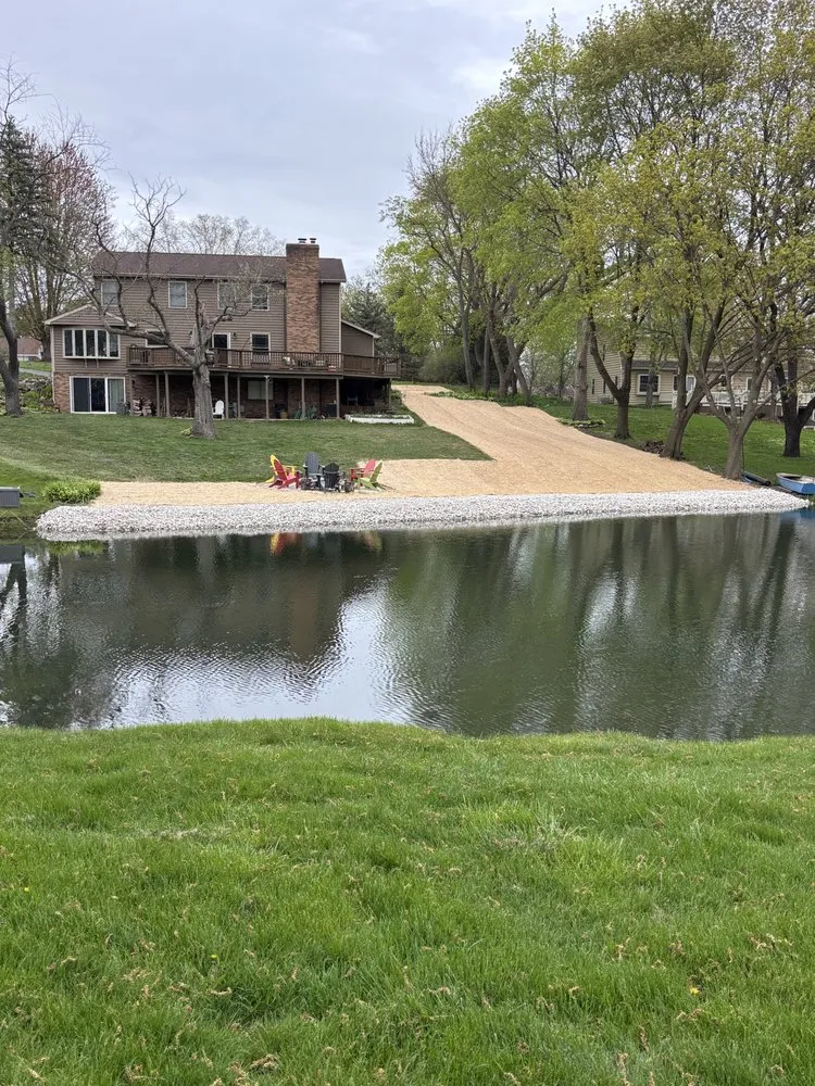 Local lawn mowing service with custom design in Bristol, WI by Aardvark