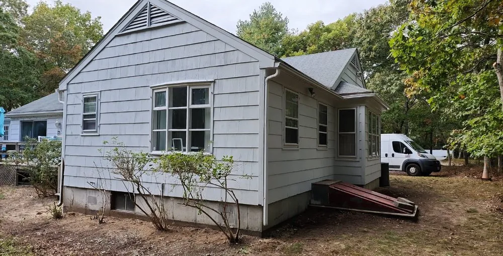 Custom residential landscaping in Shirley, NY by Aaron K Corp