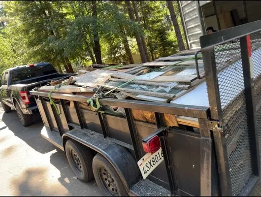 Aarons Lawn Care and Junk Removal Logo