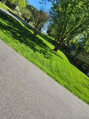 Aaron's lawn Care Logo