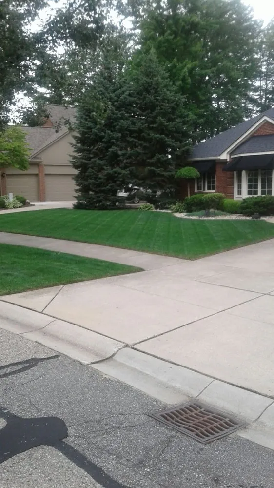 Professional garden landscaping for residential properties in Waterford Township, MI by Aaron's lawn care