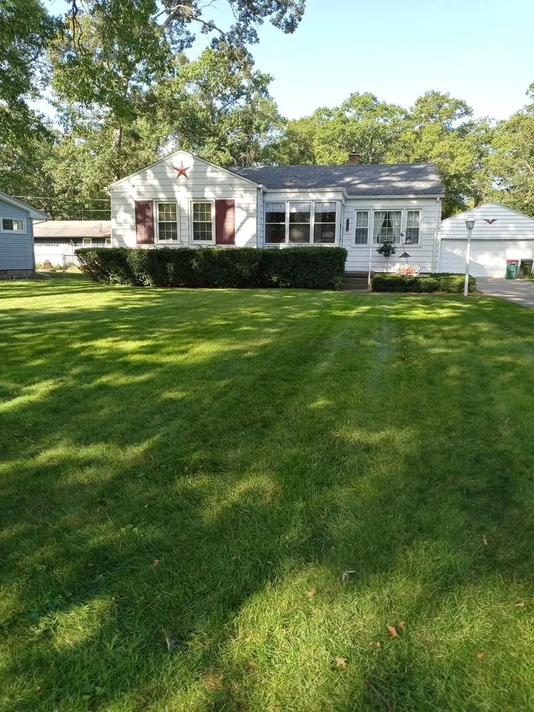 Custom lawn care service for beautiful yards in Muskegon, MI by AARON'S LAWN SERVICE