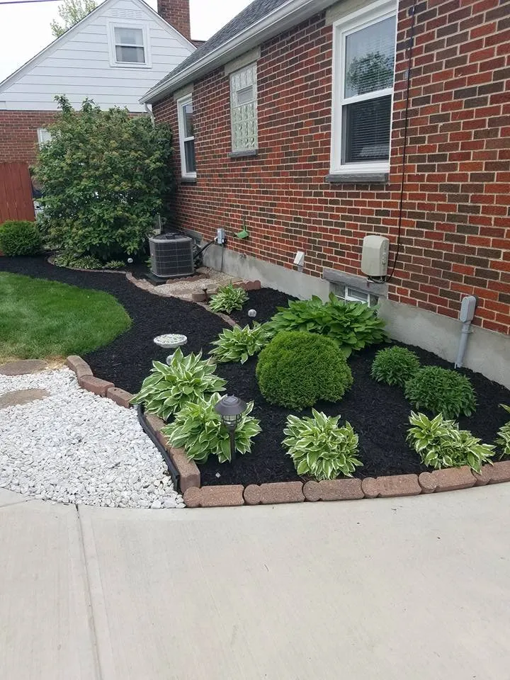 Professional yard cleanup service for homes in Dayton, OH by Aaron's Tree & Landscaping Services