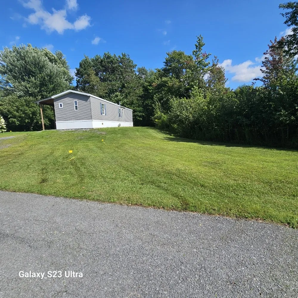 Affordable landscape design in Antwerp, NY by A&B lawn mowing