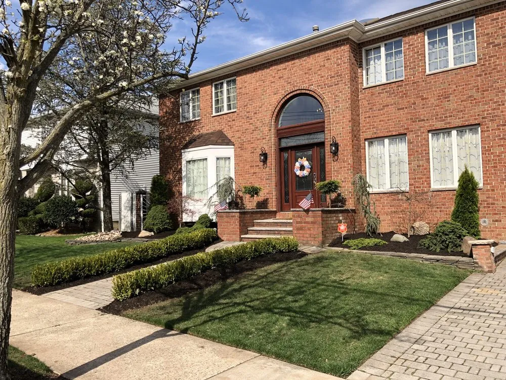 Local yard cleanup service with custom design in Staten Island, NY by Abbadessa Bros