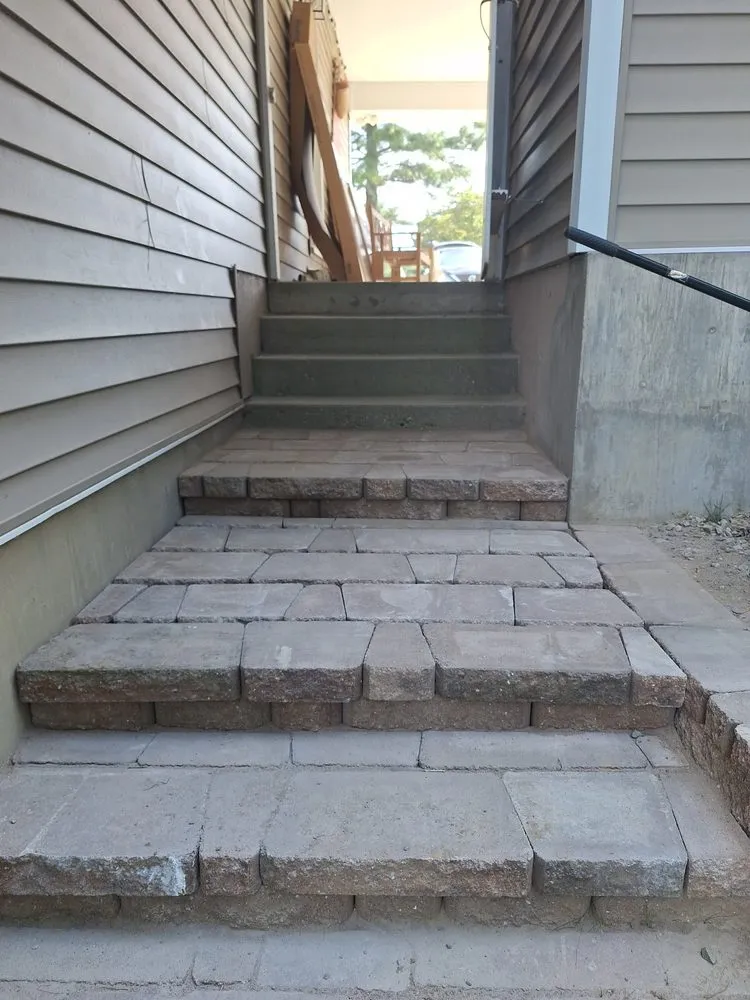 Custom residential landscaping in Weems, VA by Abbott’s Tree Service & Excavation