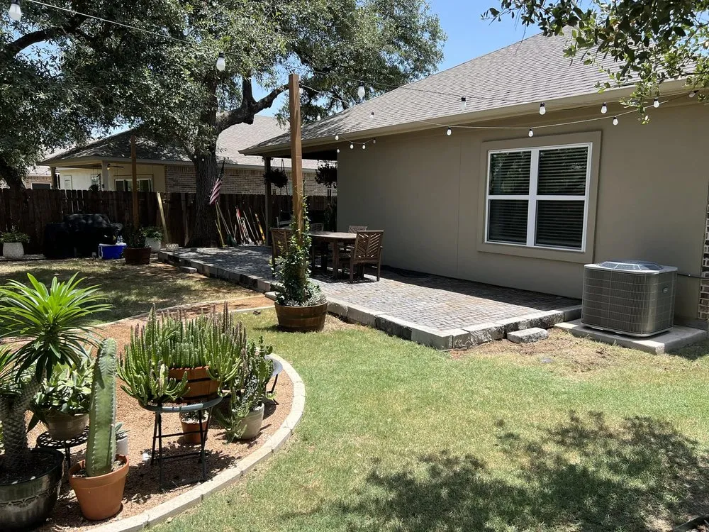 Affordable yard cleanup service in Arlington, TX by Abides Construction