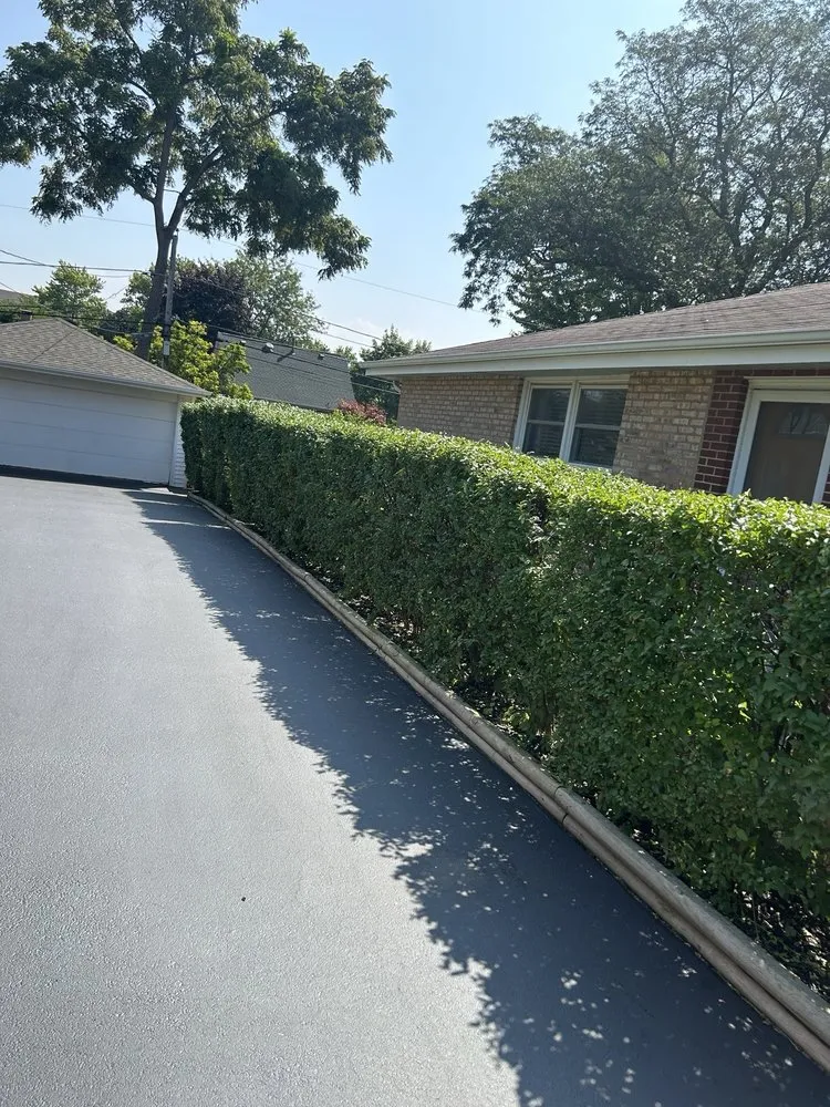 Professional yard cleanup service for year-round maintenance in Hoffman Estates, IL by ABN Seasonal Services