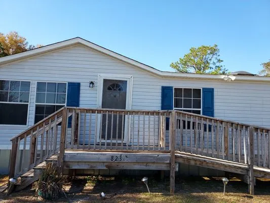 Above & Beyond All Lawn Care Logo