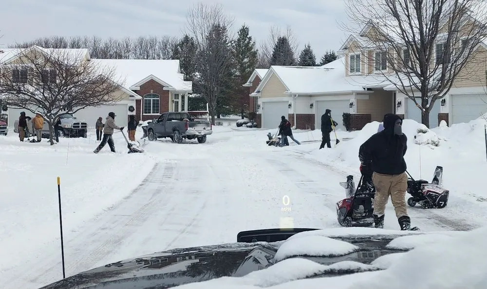 Professional lawn mowing service with custom design in Clive, IA by Above & Beyond Outdoor