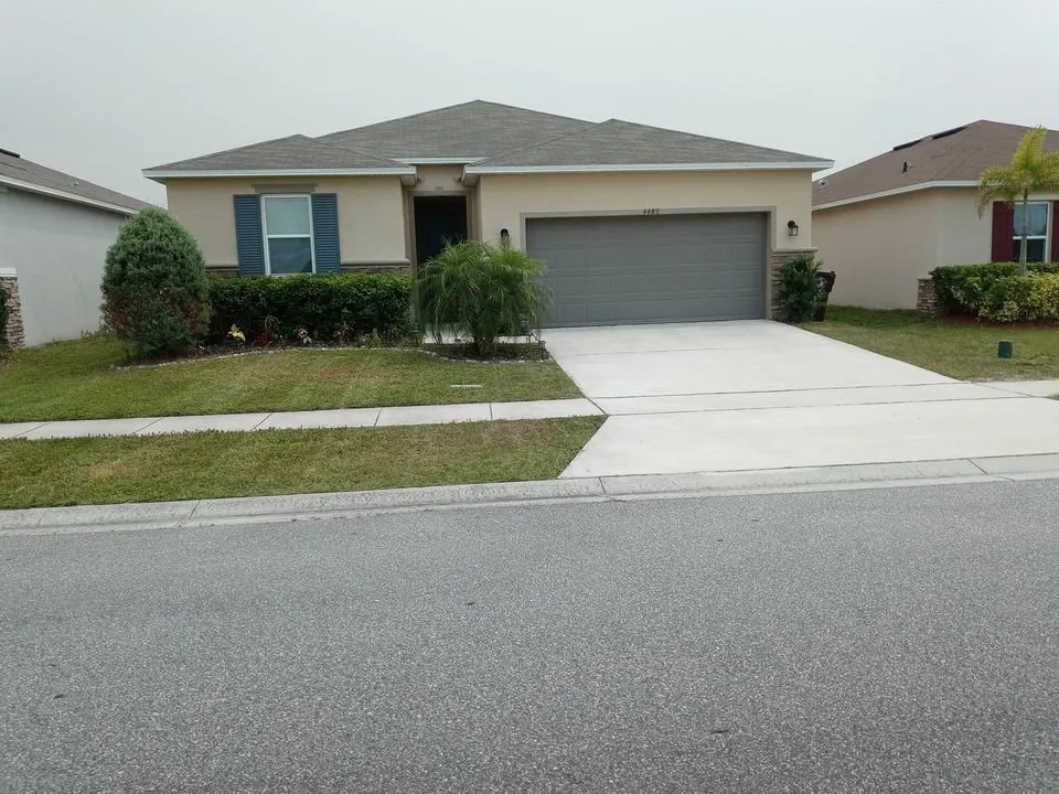 Reliable lawn mowing service for residential properties across St Cloud, FL - Above & Beyond Pressure Washing & Landscaping