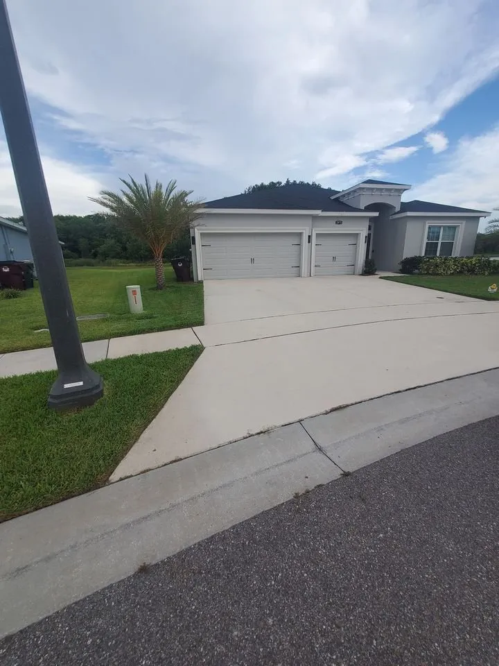 Professional lawn care service for residential properties across St Cloud, FL - Above & Beyond Pressure Washing & Landscaping