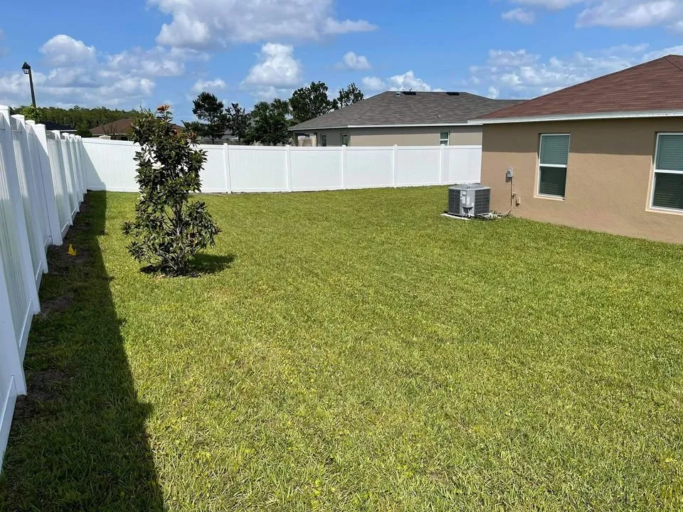 Custom yard cleanup service for year-round maintenance in St Cloud, FL by Above & Beyond Pressure Washing & Landscaping