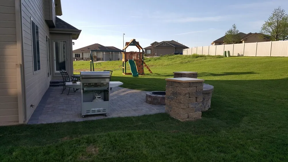 Professional yard maintenance for residential properties across Omaha, NE - Above and Beyond Complete Grounds Maintenance