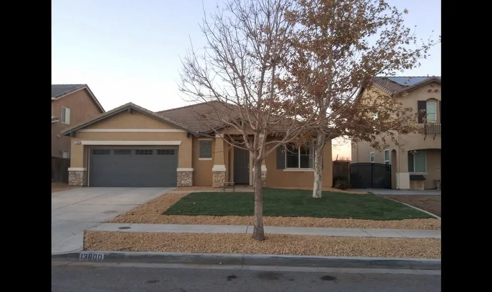 Custom outdoor landscaping in Hesperia, CA by Above And Beyond Landscaping