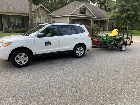 Above and Beyond Landscaping Logo