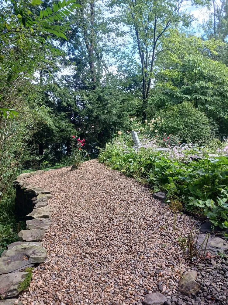 Custom garden landscaping for residential properties in Larksville, PA by Above and Beyond Lawncare