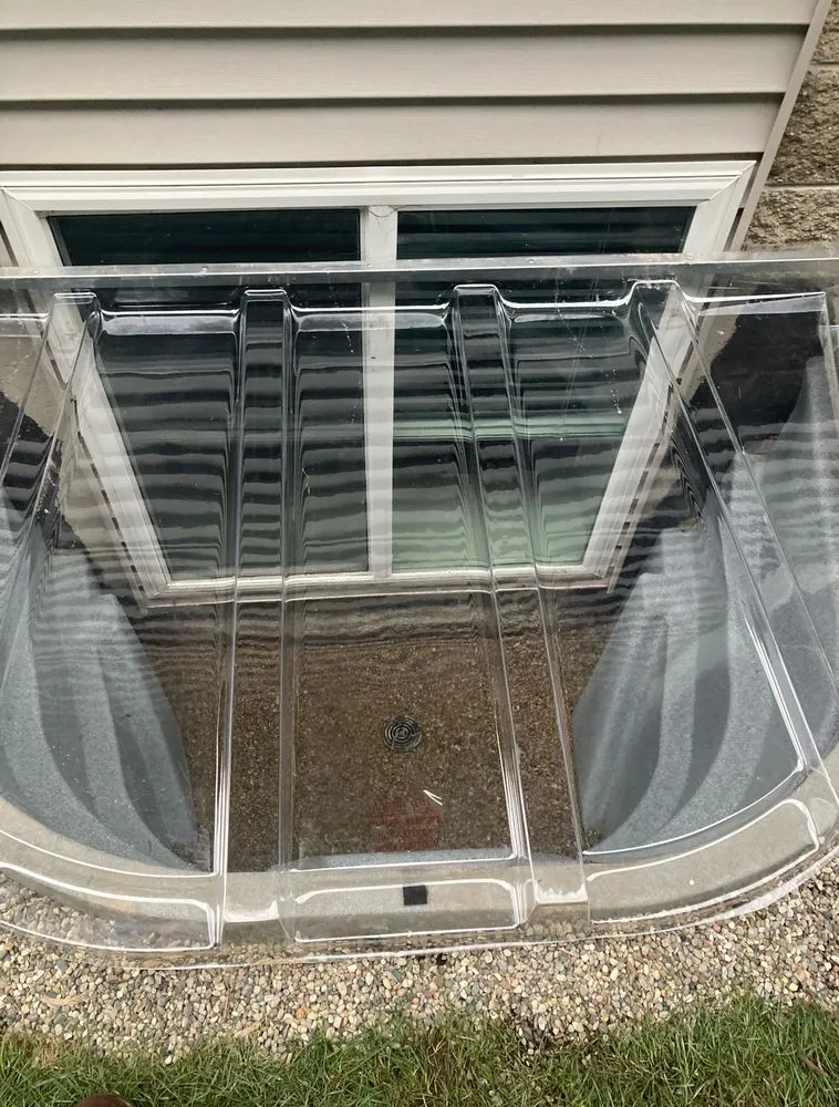 Professional lawn mowing service for residential properties in Lansing, MI by Above and Beyond Professional Services