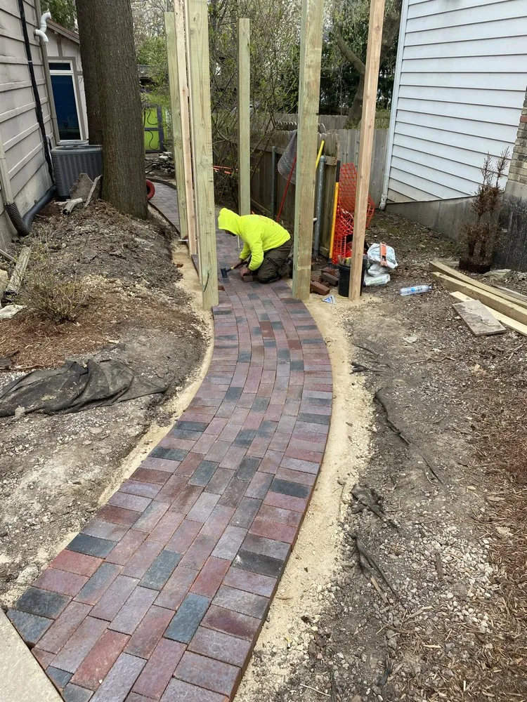 Professional yard maintenance with custom design in Madison, WI by Above The Rest Property Management