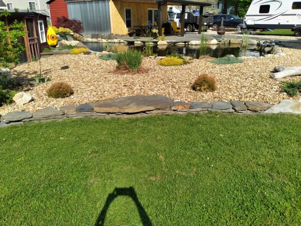 Trusted lawn mowing service for year-round maintenance across Chicopee, MA - Abram's Masonry