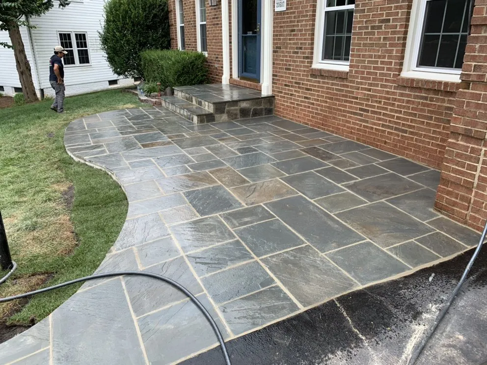 Professional yard cleanup service for outdoor upgrades across Sterling, VA - Absolute Drainage & Concrete