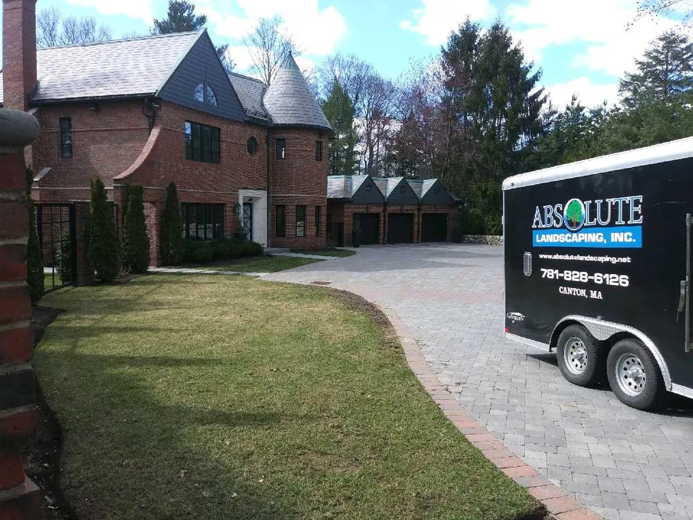 Custom landscape design for year-round maintenance across Stoughton, MA - Absolute Landscaping