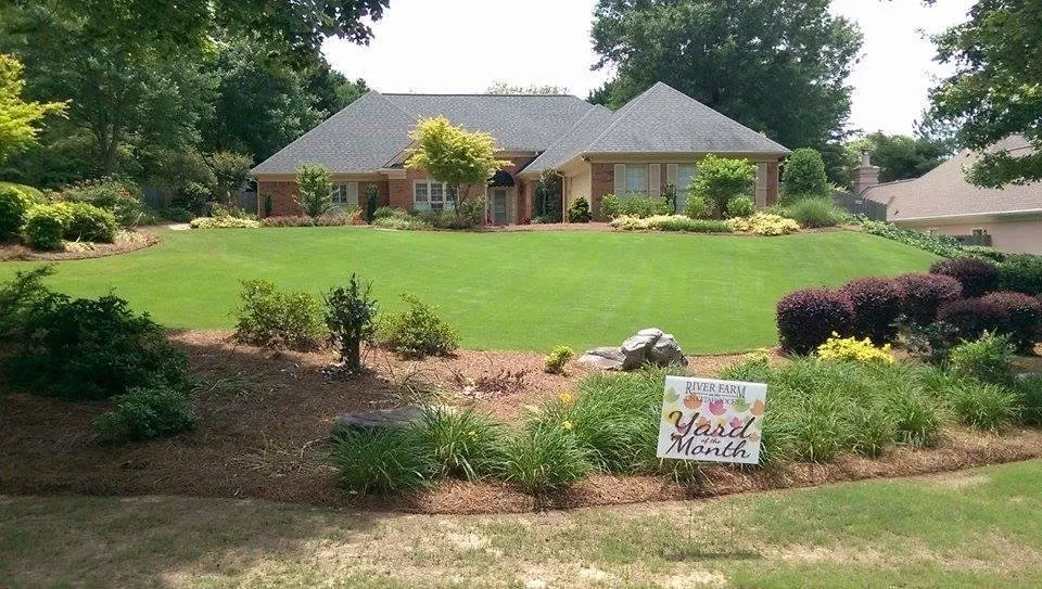 Professional garden landscaping with custom design in Cumming, GA by Absolute Lawn Pros