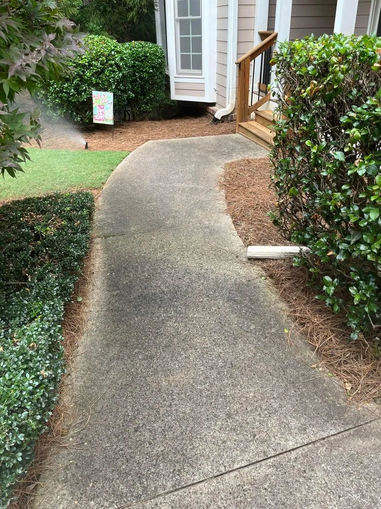 Affordable landscape design for homes in Cumming, GA by Absolute Lawn Pros