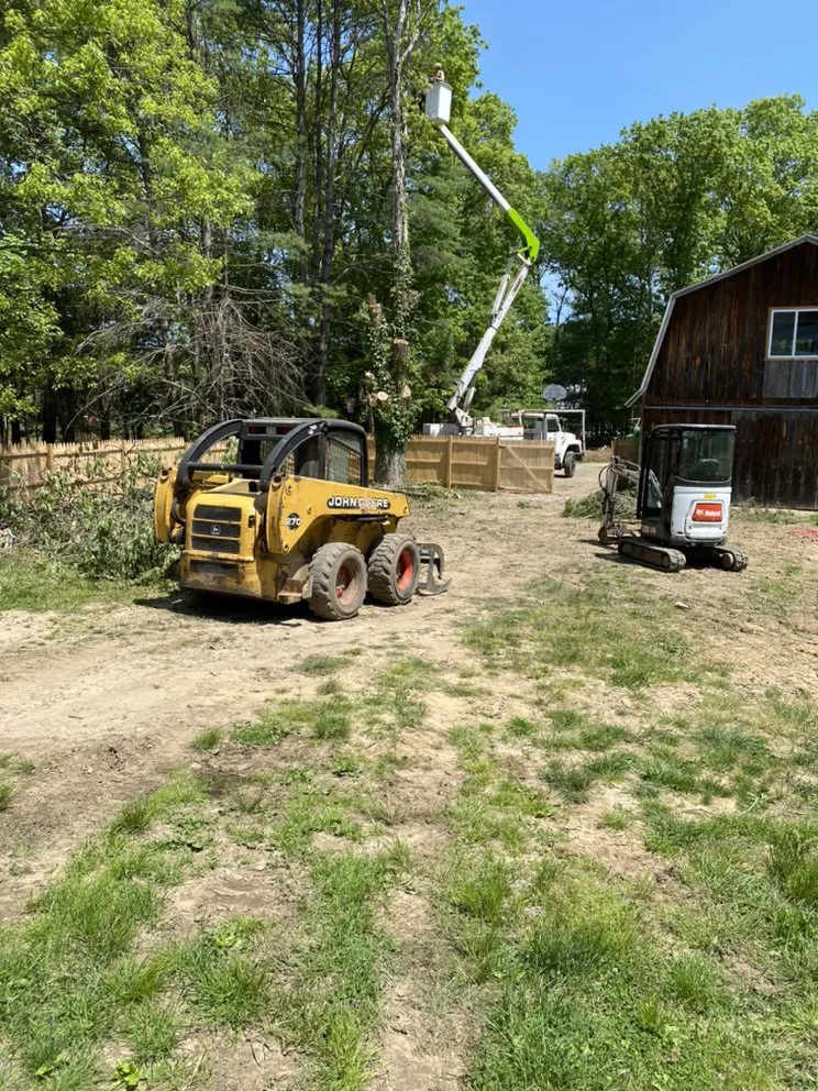 Expert yard maintenance in Middleborough, MA by Absolute Recycling Enterprises