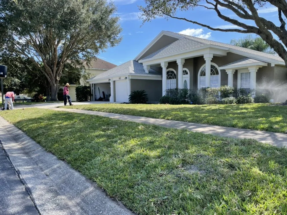 Custom landscape design for year-round maintenance in Ocoee, FL by AC Lawn Services
