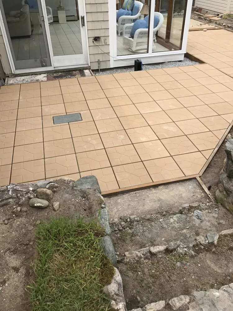 Custom lawn mowing service with custom design in Brockton, MA by AC Masonry