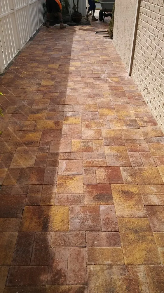 Expert lawn mowing service for residential properties in Clearwater, FL by A&C Pavers and Landscaping