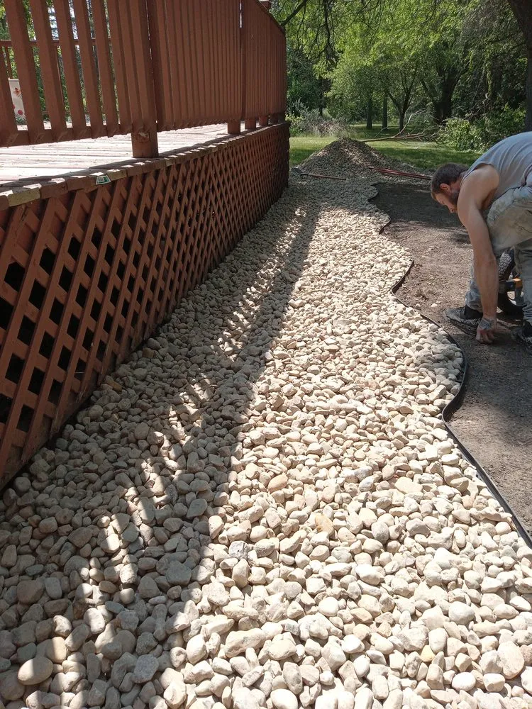 Affordable landscape design with custom design in Flint, MI by Accumod Home Improvement